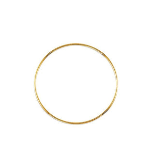 Gold hoop earring on a white background