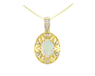 Gold pendant with a central opal stone and diamond accents on a white background