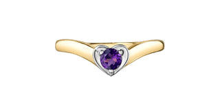 Gold ring with a heart-shaped purple gemstone on a white background