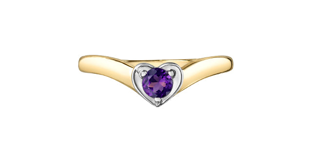 Gold ring with a heart-shaped purple gemstone on a white background