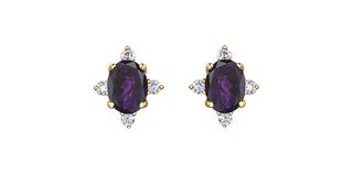 Pair of purple gemstone earrings with gold and diamond accents on a white background