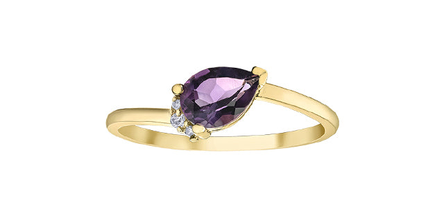 Gold ring with a purple gemstone on a white background
