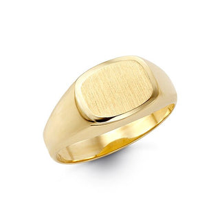 Gold ring with a rectangular face on a white background