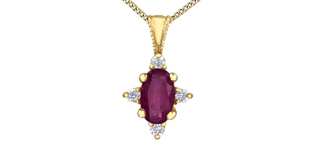 Gold pendant with a red gemstone and diamonds on a white background