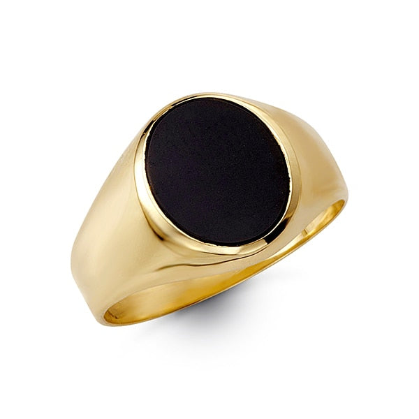 Gold ring with a black stone on a white background
