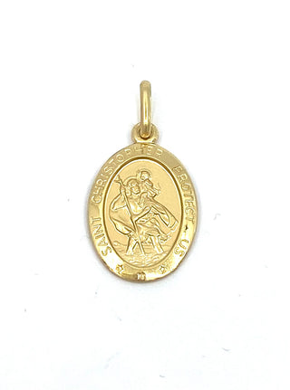 Gold Saint Christopher pendant on a white background