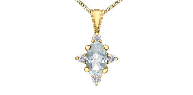 Gold pendant with a central clear gemstone and smaller diamonds on a white background