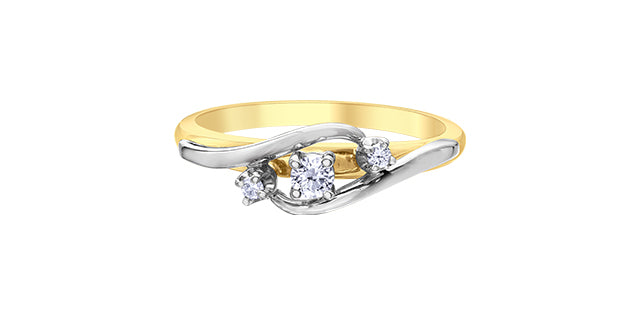 Two-tone gold and silver ring with diamond accents on a white background