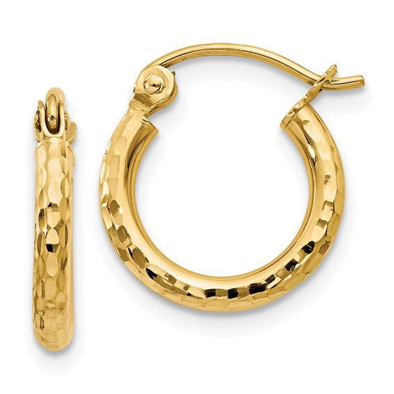 Gold hoop earrings on a white background