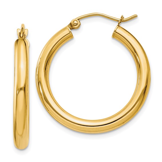 Gold hoop earrings on a white background