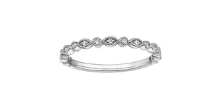 Silver ring with diamond accents on a white background