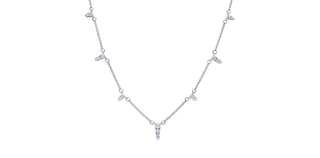 Silver necklace with small diamonds on a white background