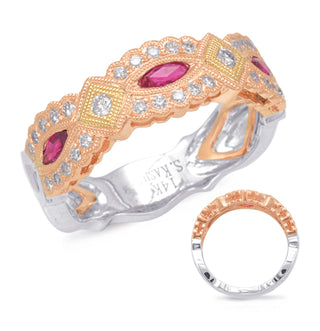 Two ornate rings with gemstones on a white background