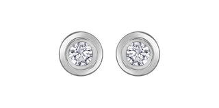 Pair of diamond stud earrings on a white background