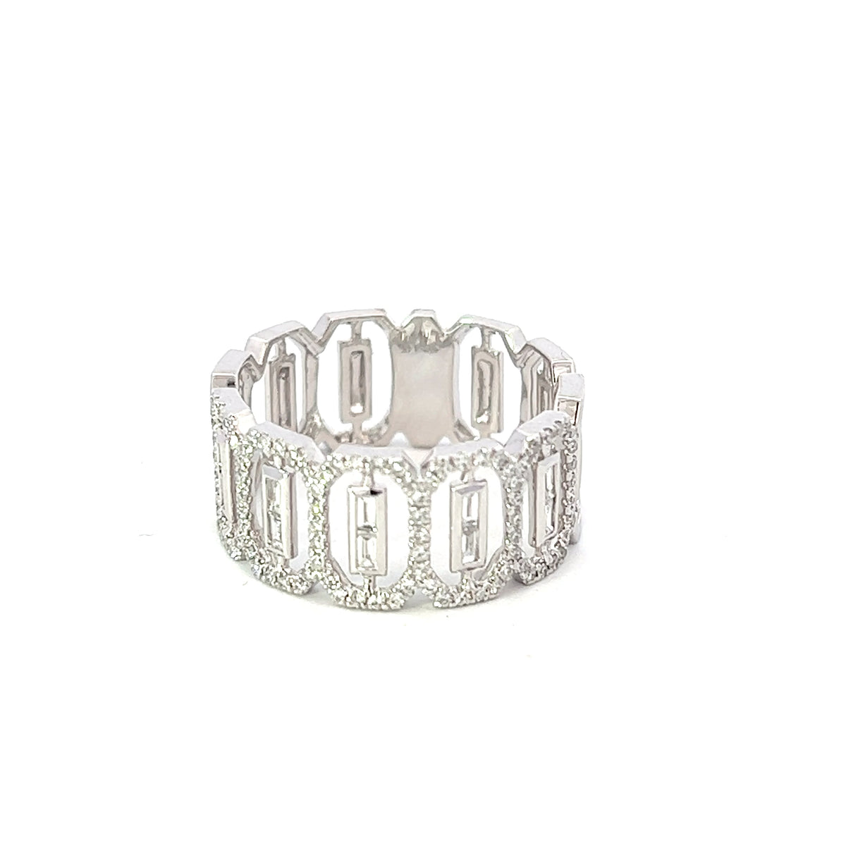 A 14K white gold diamond ring with round and baguette cuts, featuring a clear, polished finish and a very good cut grade.