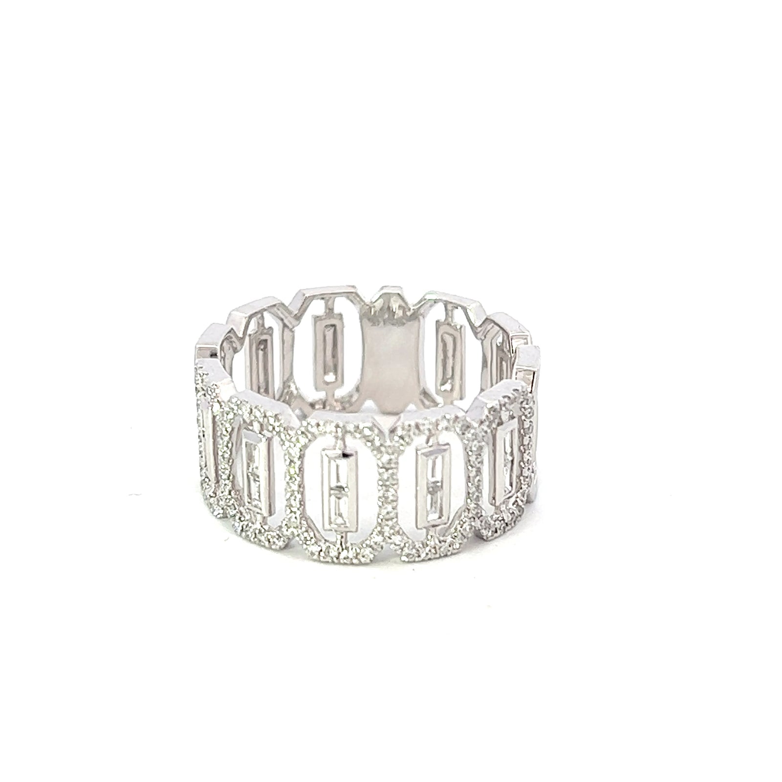 A 14K white gold diamond ring with round and baguette cuts, featuring a clear, polished finish and a very good cut grade.