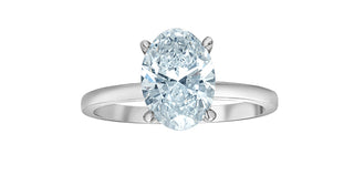 Silver ring with a large oval diamond on a white background