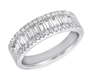 Diamond ring with baguette and round cut stones on a white background
