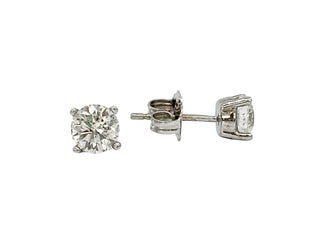 Diamond stud earrings on a white background