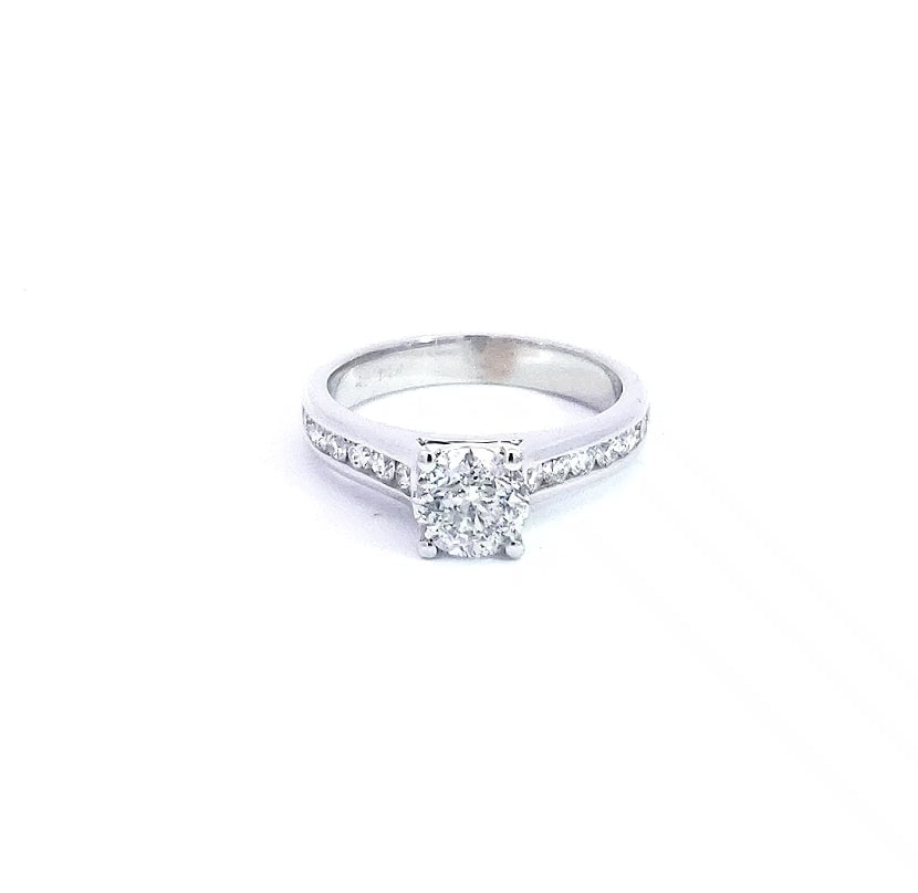 A 14K white gold engagement ring with a round brilliant cut diamond centerpiece, surrounded by smaller white diamonds set in a band.