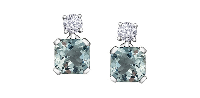 Pair of earrings with square gemstones and clear stones on a white background