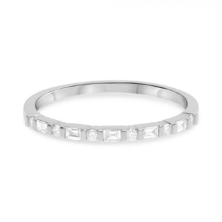 Silver ring with small diamonds on a white background