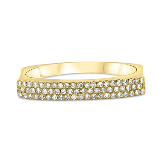 Gold ring with diamond accents on a white background