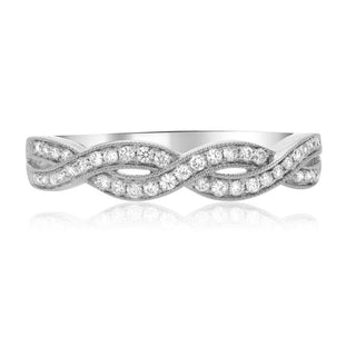 Silver ring with diamond accents on a white background