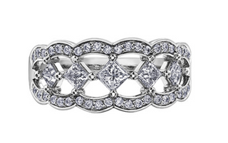 Silver ring with diamond accents on a white background
