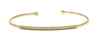 Gold bracelet on a white background