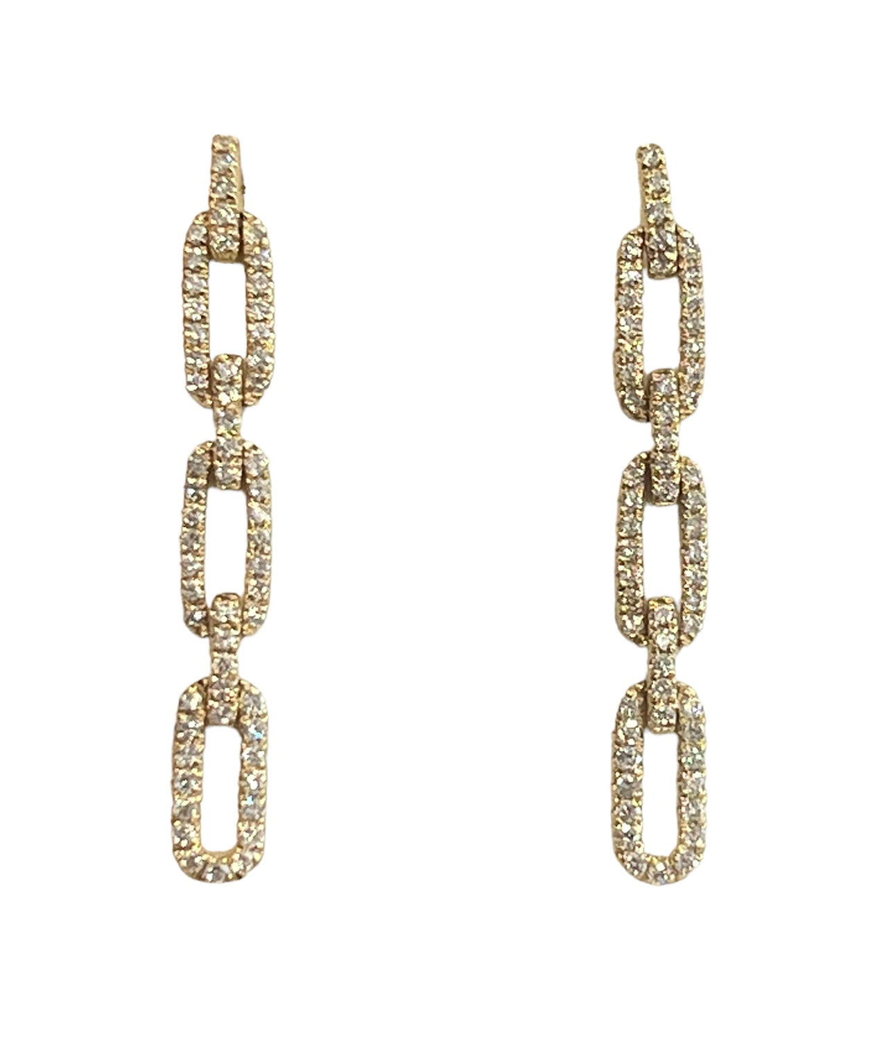 Gold chain-style earrings on a white background