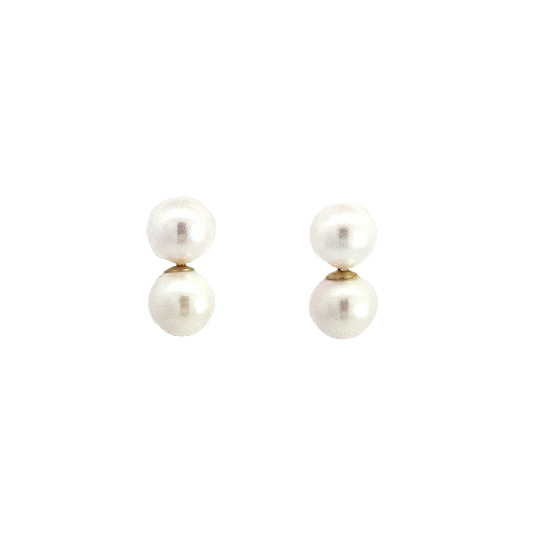 Pair of pearl earrings on a white background
