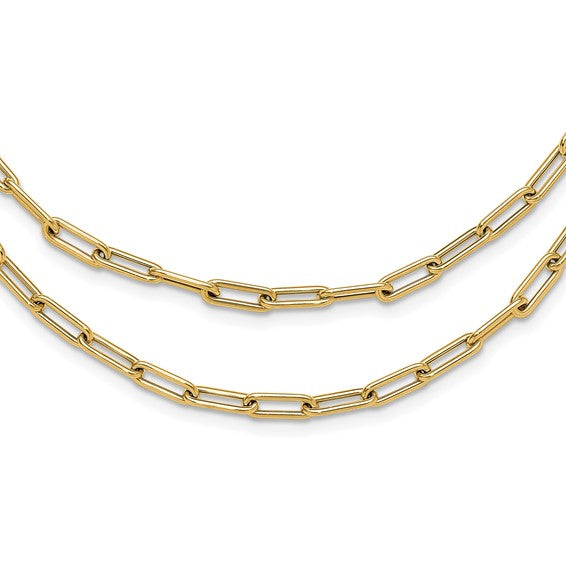 Two gold chain necklaces on a white background
