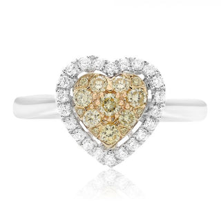 Heart-shaped diamond ring with gold and silver accents on a white background
