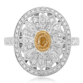 Elegant ring with a gold center and silver decorative band on a white background