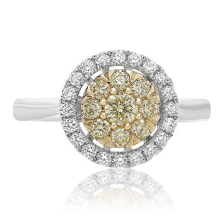 Diamond ring with a two-tone design on a white background