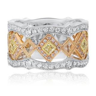 Gold and silver ring with diamond patterns on a white background