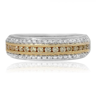 Two-tone diamond ring with gold and silver bands on a white background