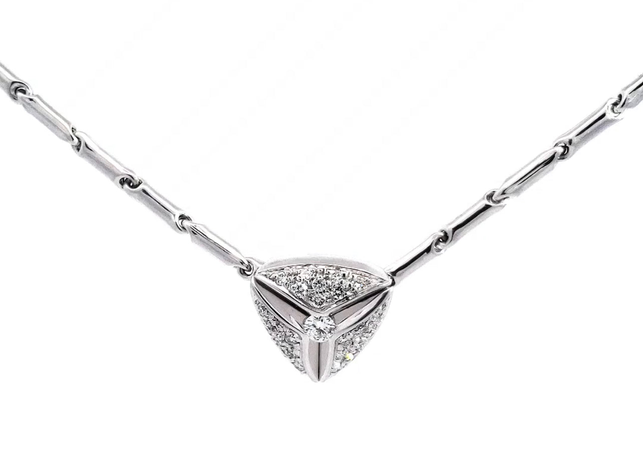 An 18K white gold diamond pave necklace with multiple sparkling diamonds set in a V-shaped design.