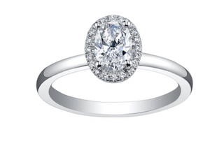 Silver ring with a diamond on a white background