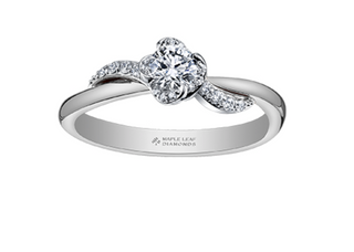 Diamond ring with a bow design on a white background, featuring the Maple Leaf Diamonds brand.