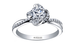 Diamond ring with 'Maple Leaf Diamonds' engraving on a white background