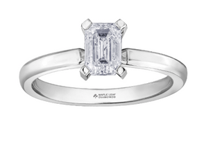 Diamond ring with emerald-cut diamond on a white background, featuring Maple Leaf Diamonds branding.