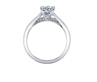 Diamond ring with a clear gemstone on a white background