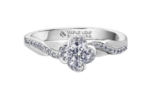 Diamond ring with 'Maple Leaf' branding on a white background