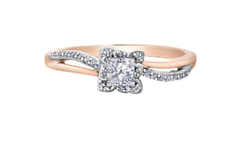 Rose gold and silver diamond ring on a white background