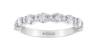 Diamond ring with 'Maple Leaf Diamonds' engraving on a white background