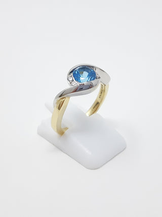 Blue Topaz and Diamond Ring
