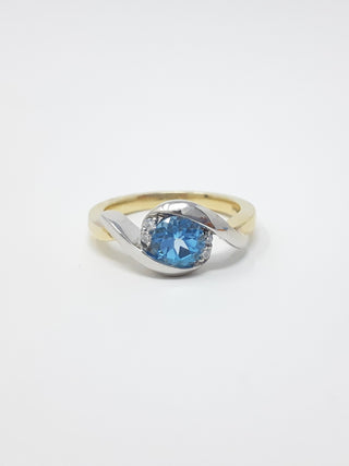 Blue Topaz and Diamond Ring