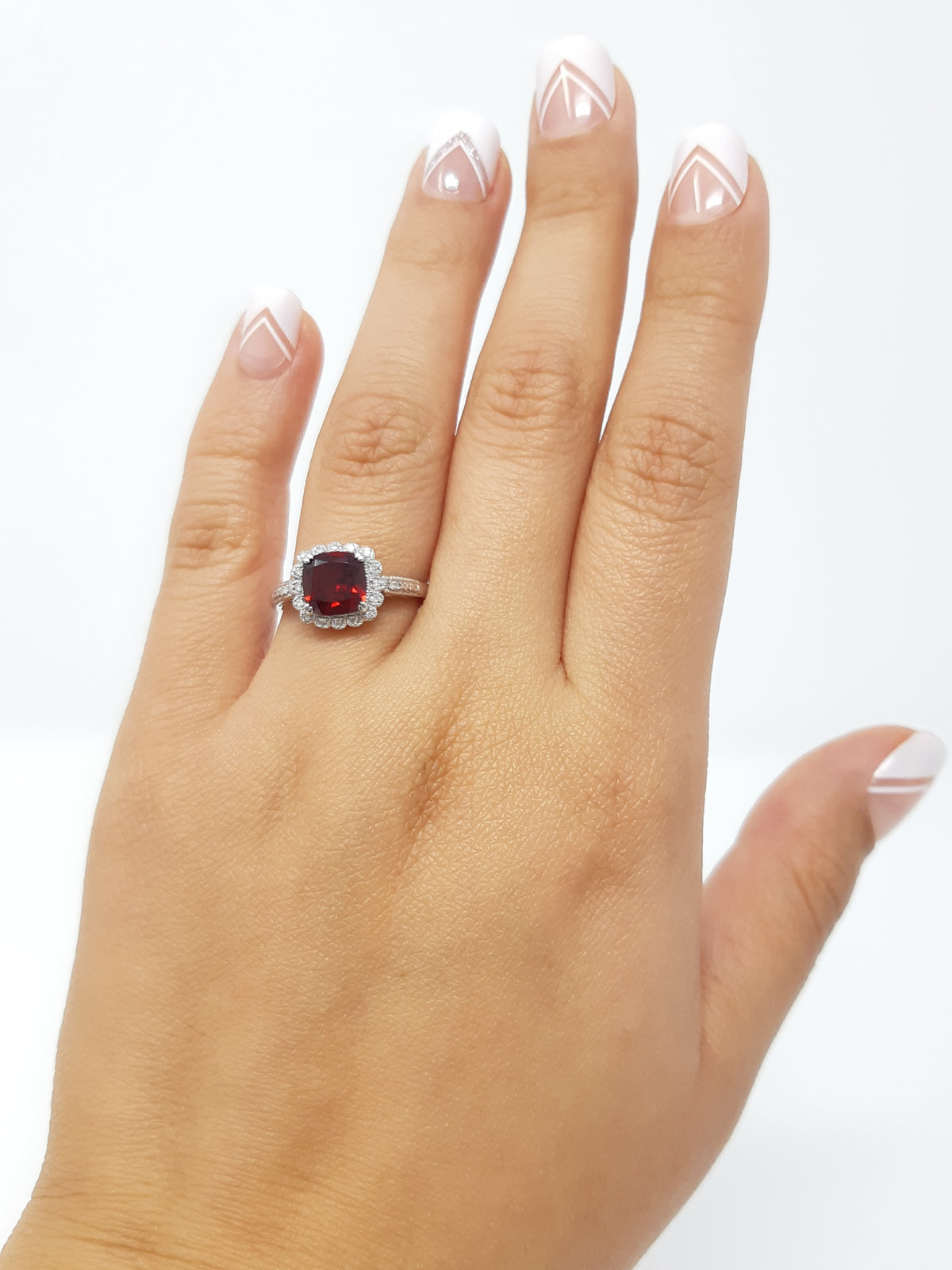 10K White Gold Garnet and 0.07cttw Diamond Ring